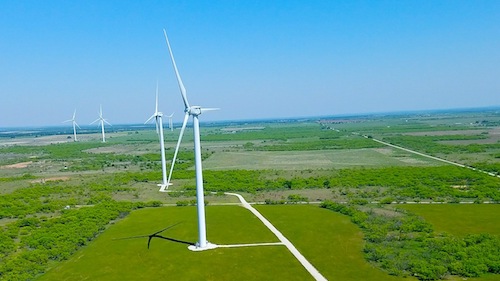 Wind Turbines over Green Fields
